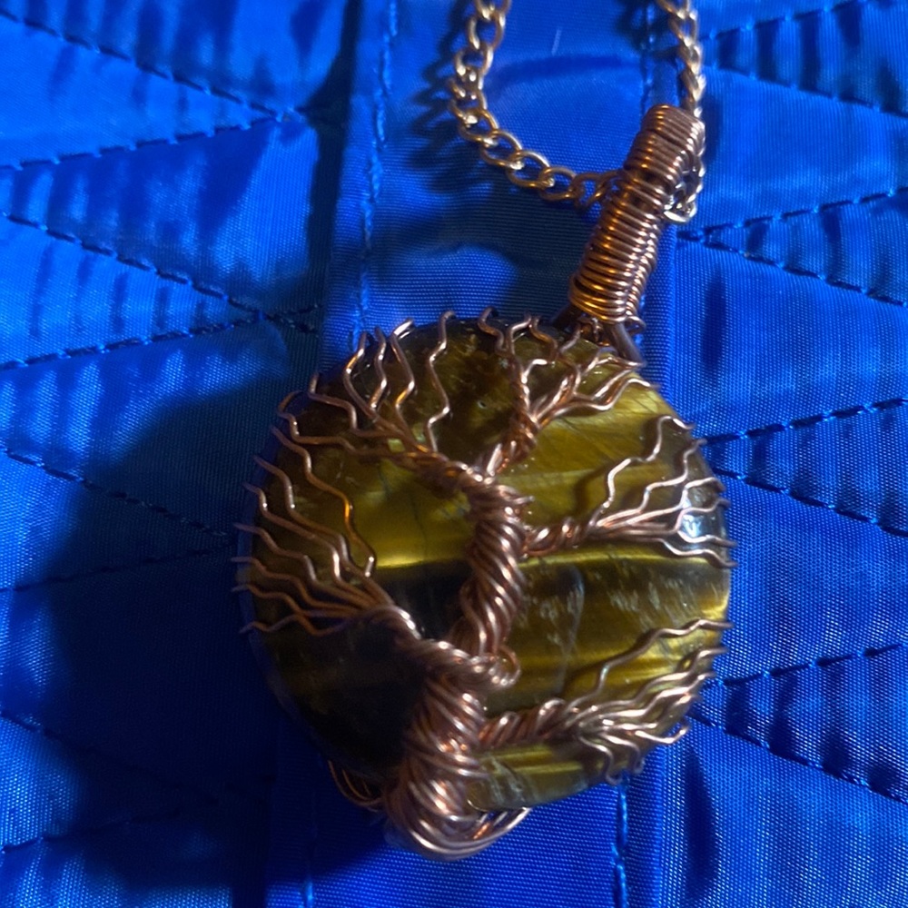 Adjustable hand copper color wire wrapped, tree of life, with tiger’s eye gem